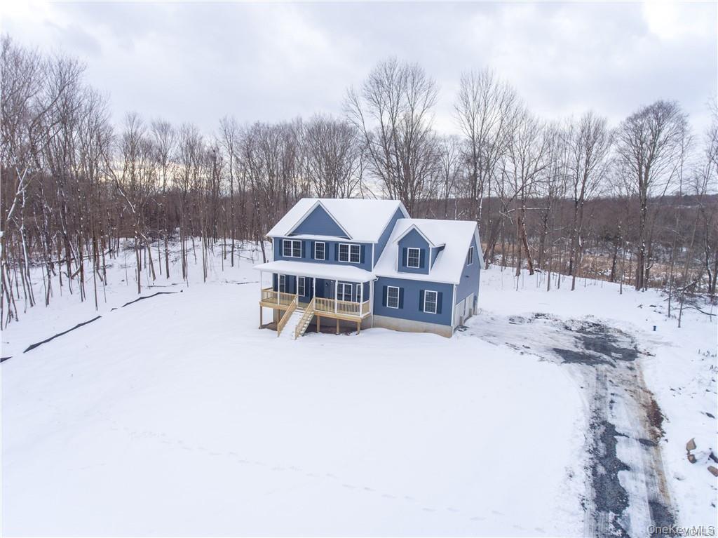 5 Harrier Ridge Drive Wallkill, NY 12589 - Photo 30 of 32 View of front of home featuring stairway and a wooden deck