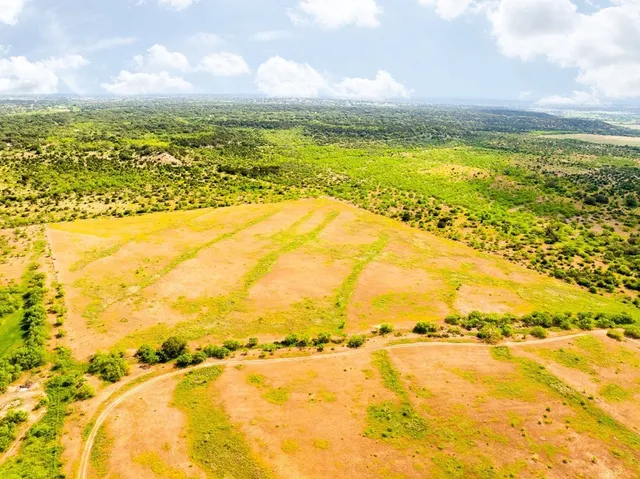 a view of an ocean with city