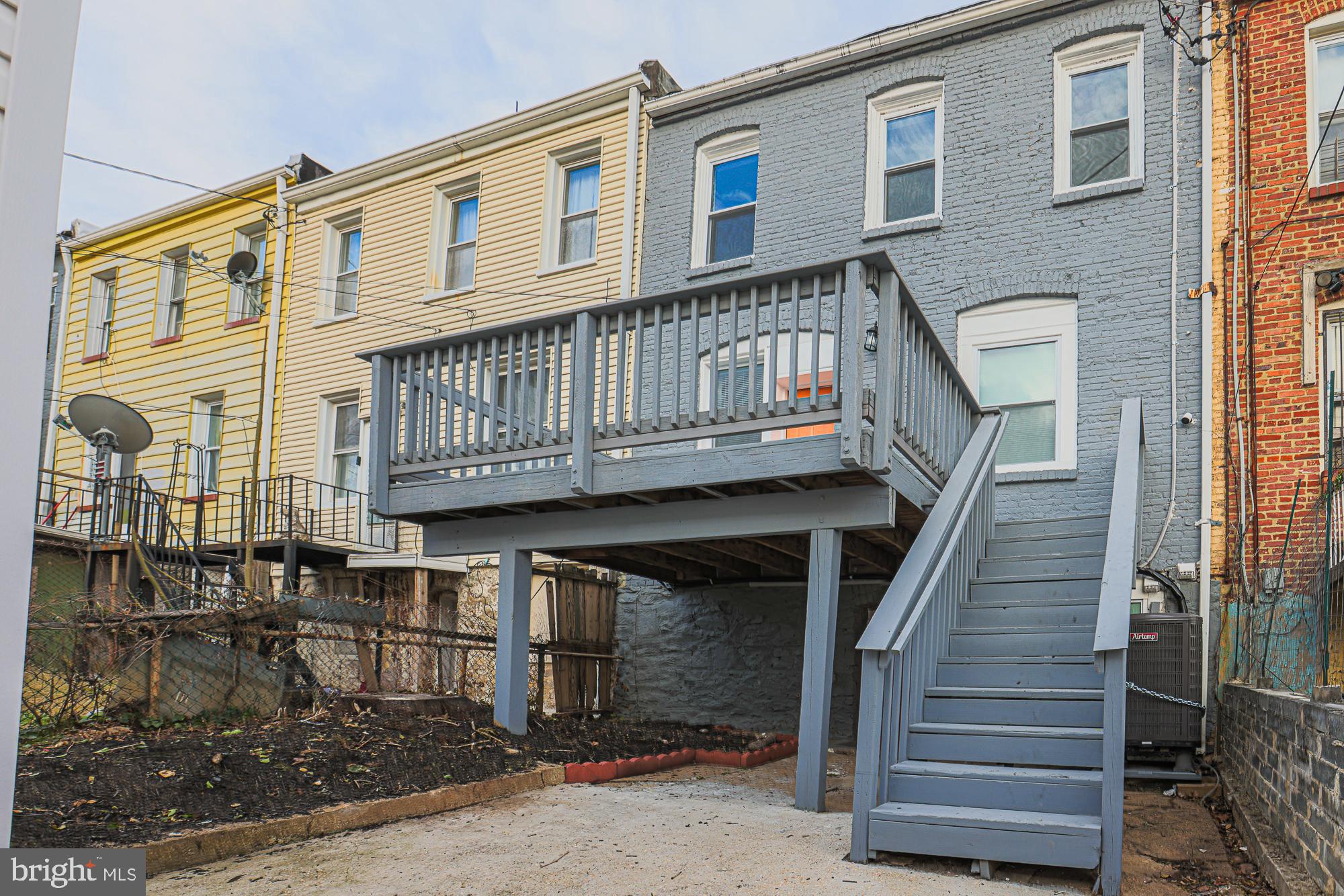 3611 Belair Road Baltimore, MD 21213 - Photo 12 of 60 a view of a house with wooden stairs