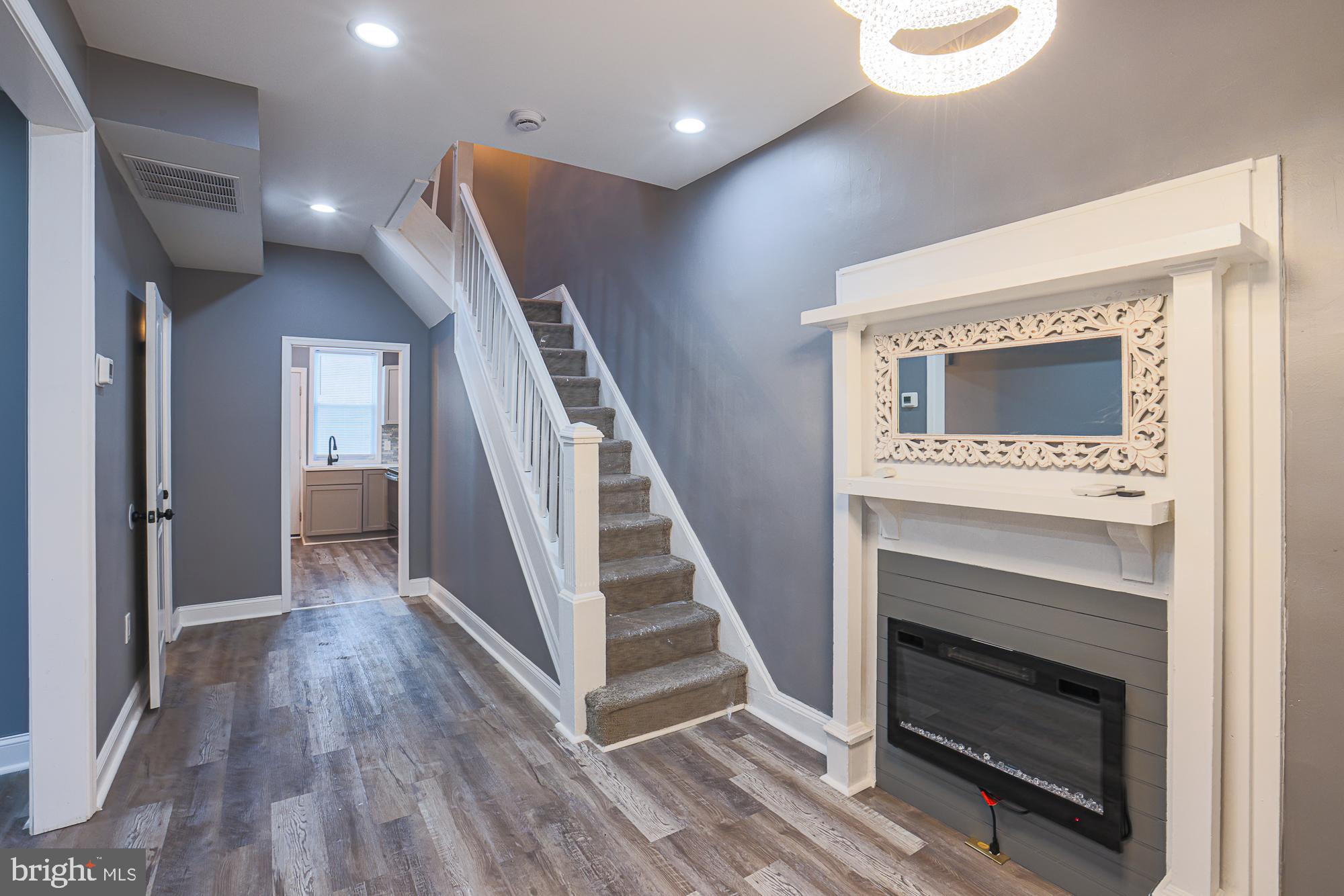 3611 Belair Road Baltimore, MD 21213 - Photo 17 of 60 a view of entryway and hall with wooden floor