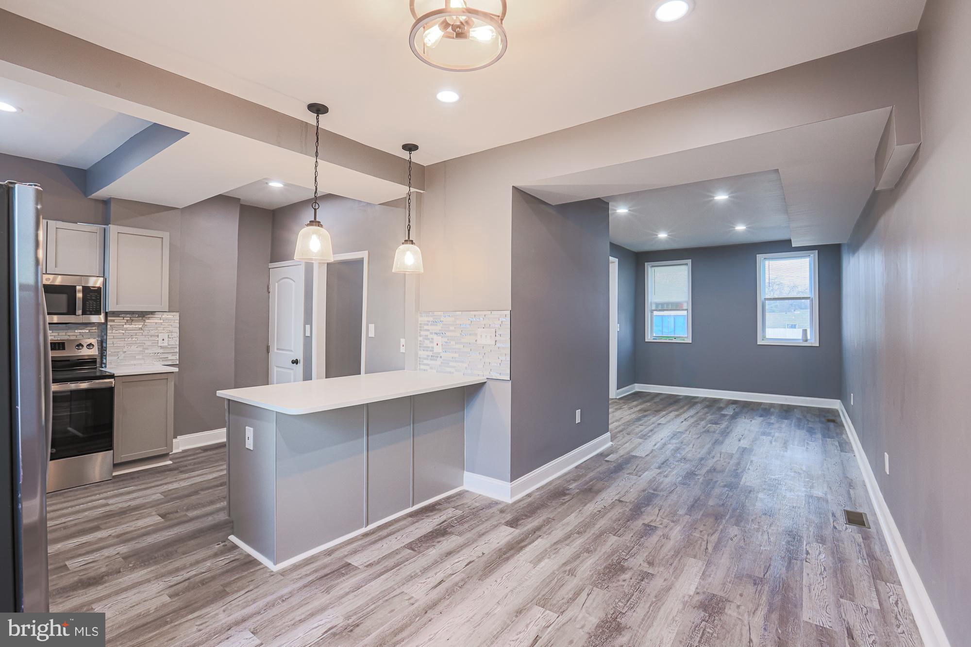 3611 Belair Road Baltimore, MD 21213 - Photo 26 of 60 a view of kitchen and sink area in a room