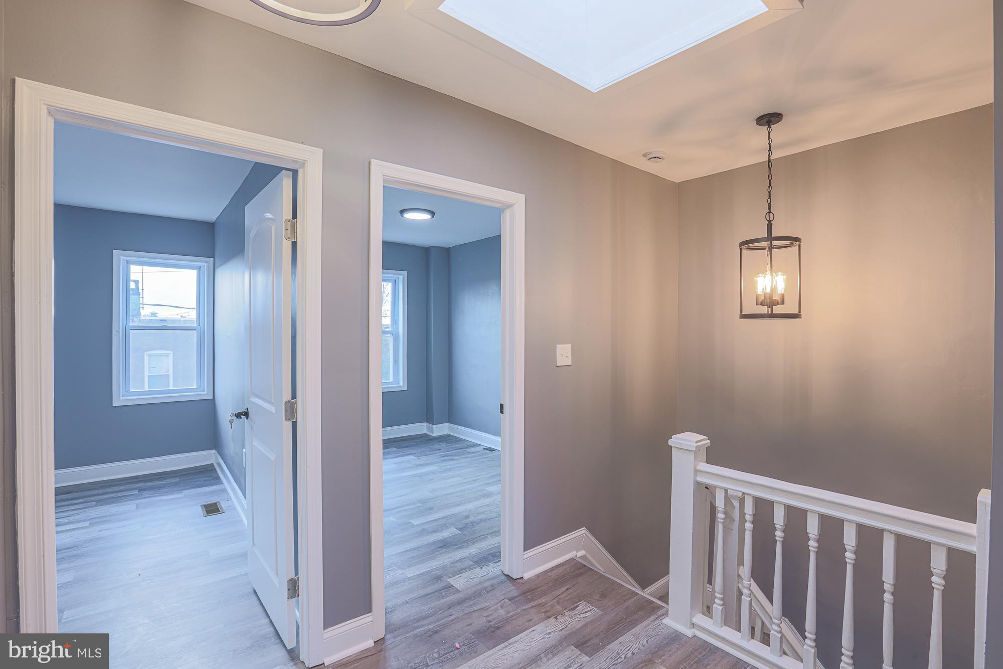 3611 Belair Road Baltimore, MD 21213 - Photo 59 of 60 a view of a hallway with wooden floor
