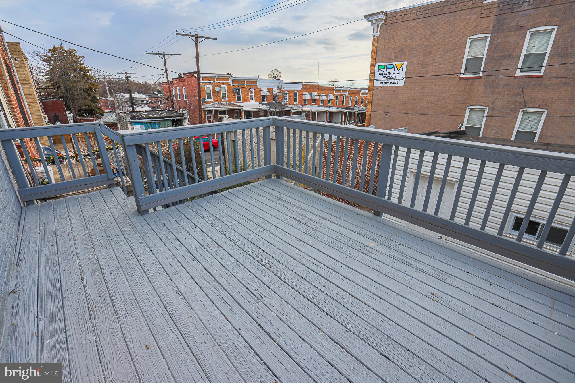 3611 Belair Road Baltimore, MD 21213 - Photo 6 of 60 a view of balcony with wooden floor