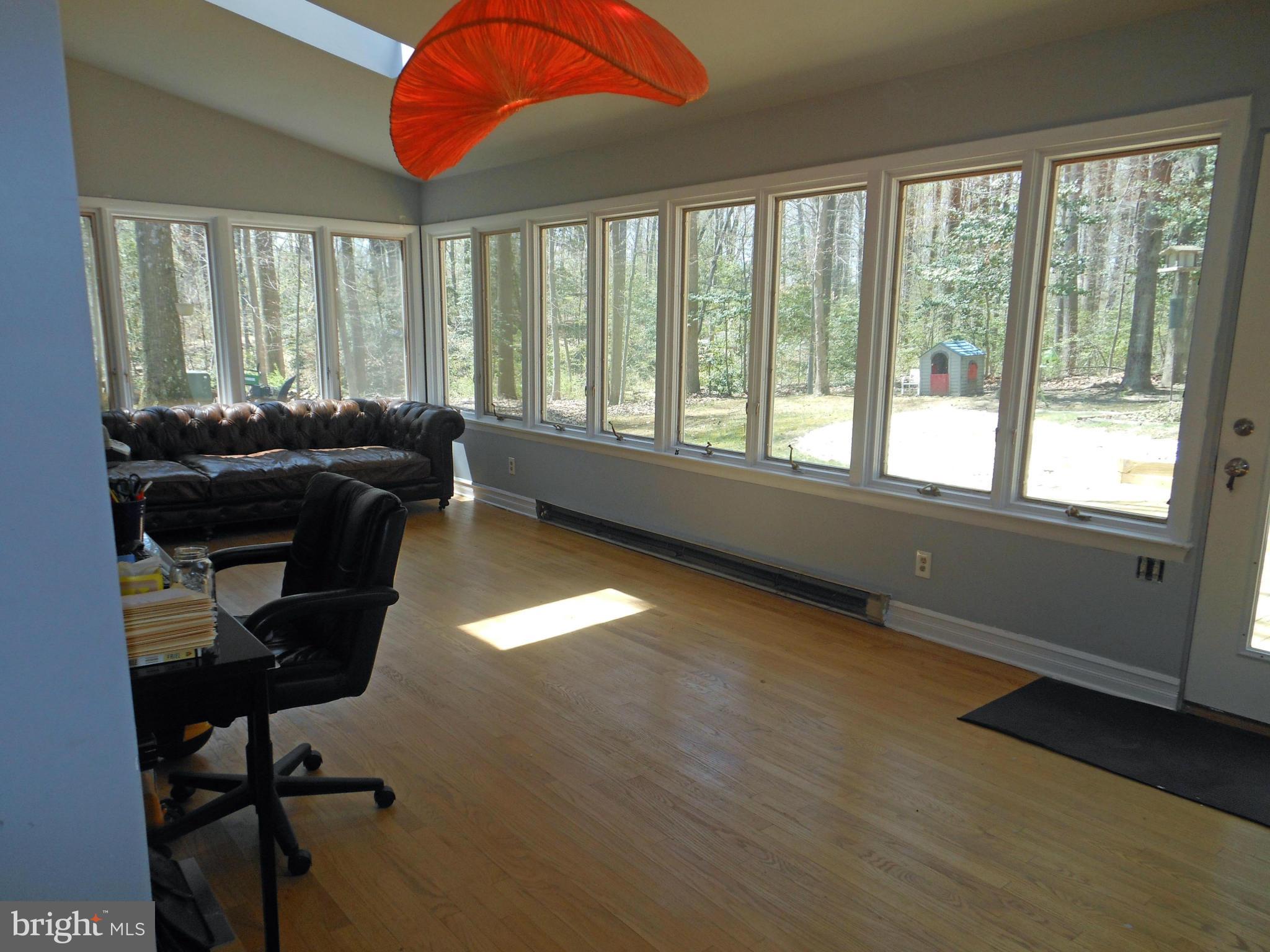 56 Wallace Manor Road Edgewater, MD 21037 - Photo 14 of 26 Sunroom - truly sunny and bright