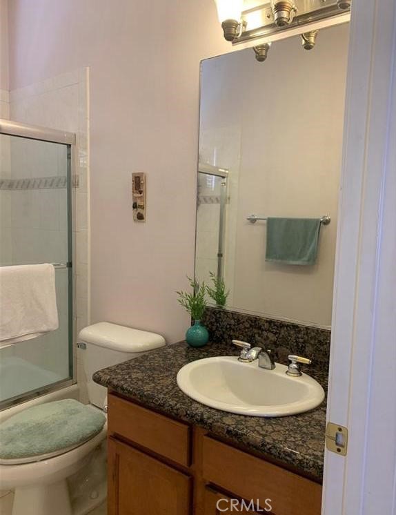 719 Arcadia Avenue, Unit B Arcadia, CA 91007 - Photo 13 of 23 a bathroom with a granite countertop sink and a mirror