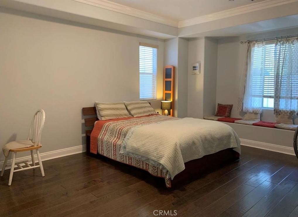 719 Arcadia Avenue, Unit B Arcadia, CA 91007 - Photo 15 of 23 a bedroom with a bed chair and window
