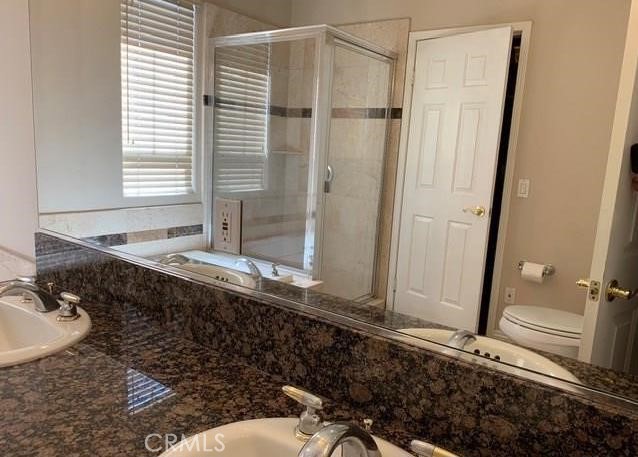 719 Arcadia Avenue, Unit B Arcadia, CA 91007 - Photo 18 of 23 a bathroom with a granite countertop sink and a mirror