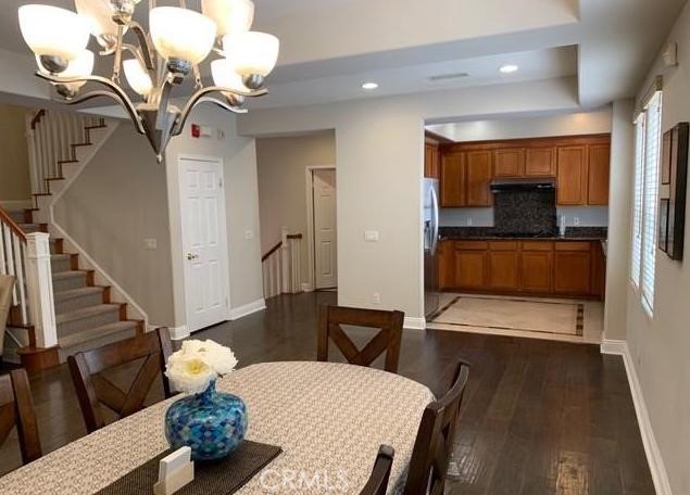 719 Arcadia Avenue, Unit B Arcadia, CA 91007 - Photo 2 of 23 a living room with furniture and wooden floor