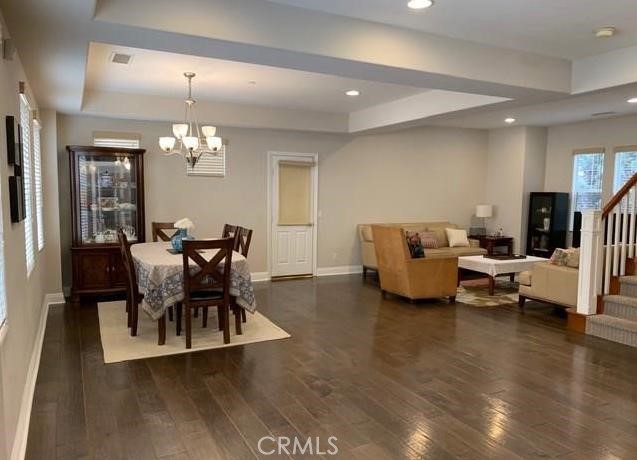 719 Arcadia Avenue, Unit B Arcadia, CA 91007 - Photo 3 of 23 a view of a dining room with furniture and wooden floor