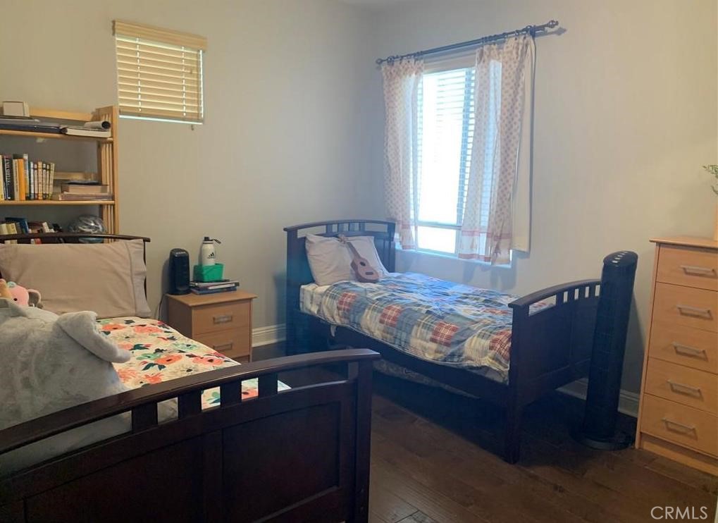 719 Arcadia Avenue, Unit B Arcadia, CA 91007 - Photo 9 of 23 a bed sitting in a bedroom next to a window