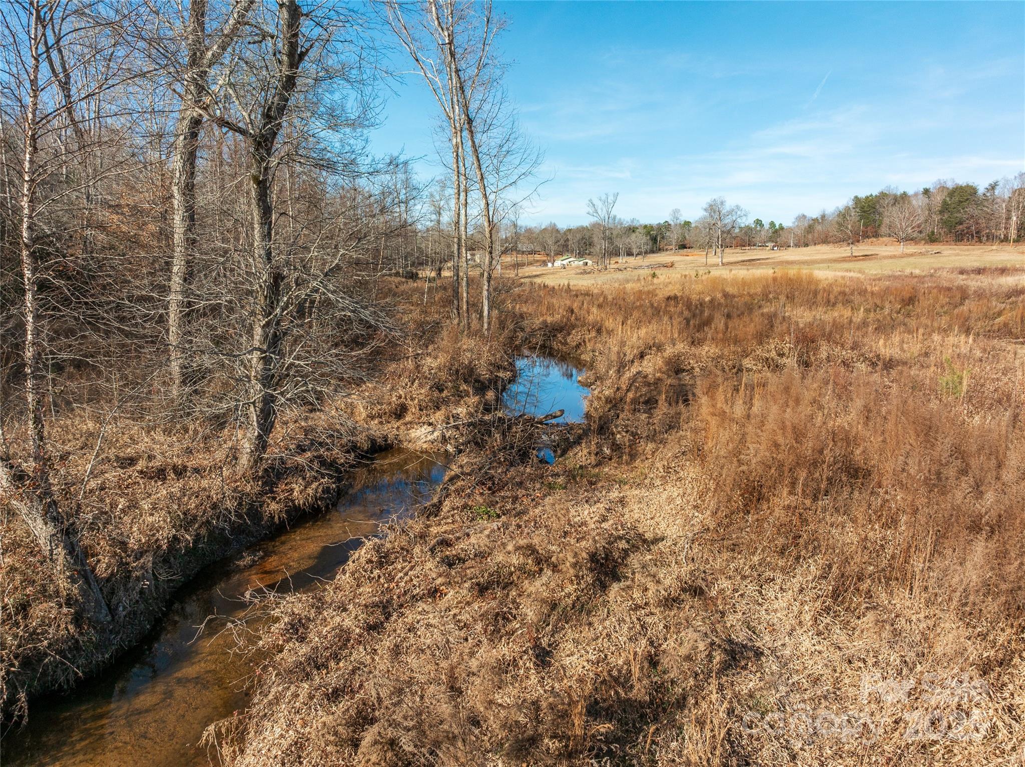 12-acres Polk County Line Road Rutherfordton, NC 28139 - Photo 6 of 23 a view of a yard with wooden fence