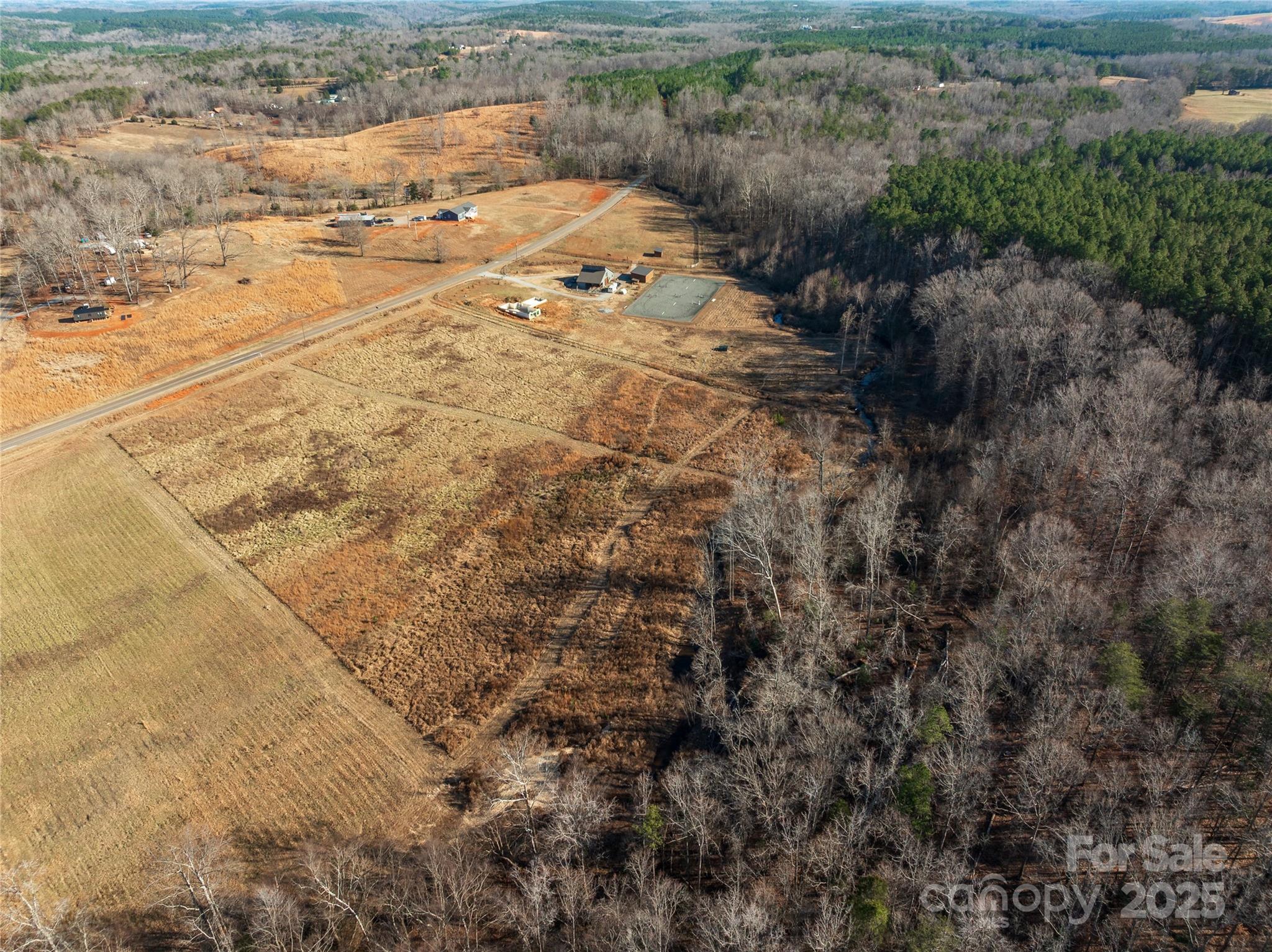 12-acres Polk County Line Road Rutherfordton, NC 28139 - Photo 10 of 23 a view of a yard with wooden fence