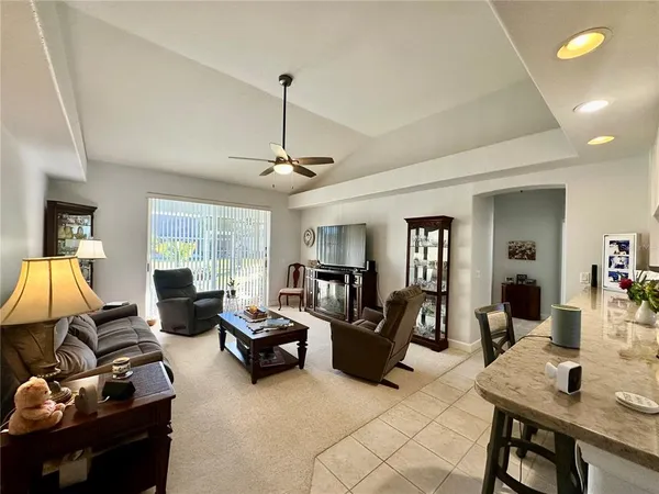 a bedroom with a bed and a table