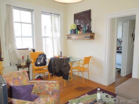 25 High Street, Unit 21 New Haven, CT 06510 - Photo 2 of 6 a living room with furniture and a window