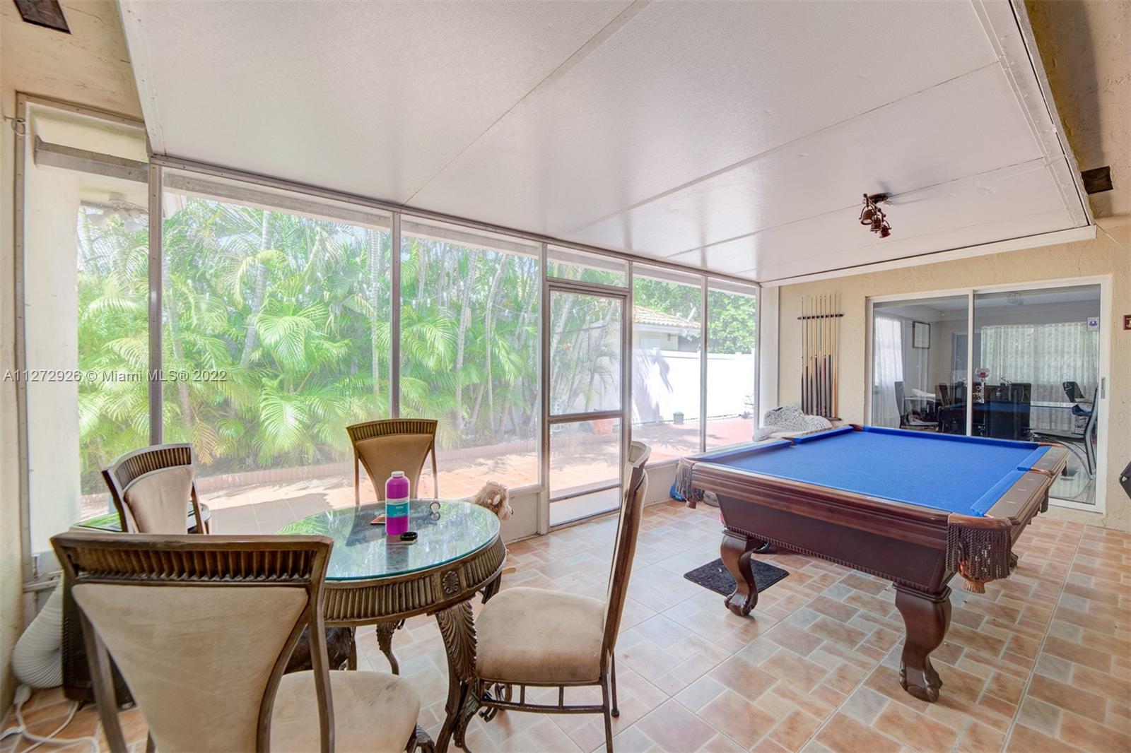 14480 Southwest 112th Street Miami, FL 33186 - Photo 12 of 37 a room with furniture and a large window