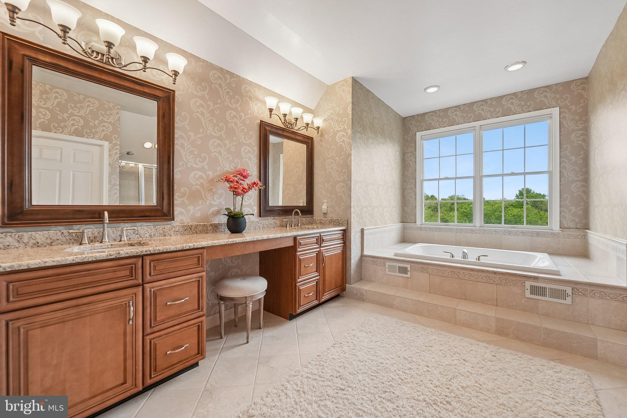 1 Baker Way Pennington, NJ 08534 - Photo 36 of 77 a bathroom with a granite countertop sink mirror and a bathtub