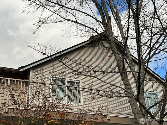 a front view of a house with balcony