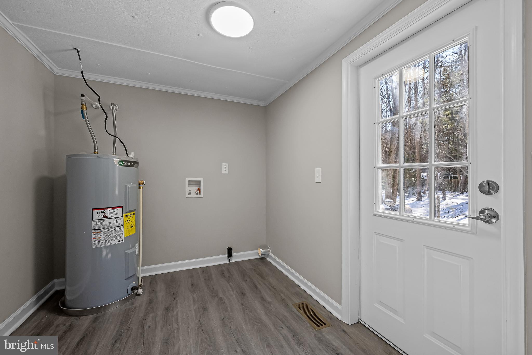 14018 Oak Branch Road Delmar, DE 19940 - Photo 18 of 20 a view of empty room with wooden floor and fan