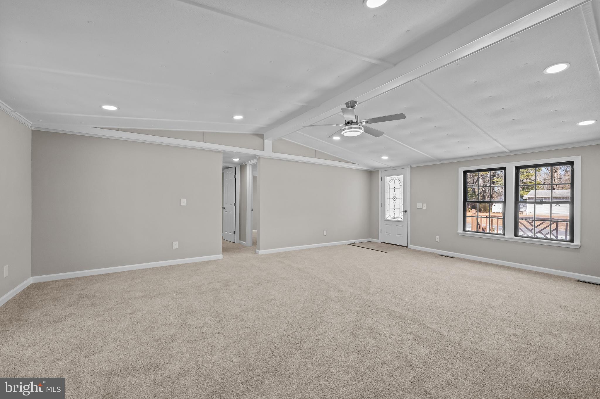 14018 Oak Branch Road Delmar, DE 19940 - Photo 7 of 20 a view of an empty room with a window