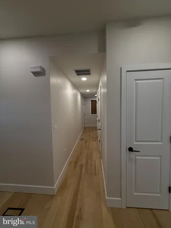 a bed room with a bed and a television