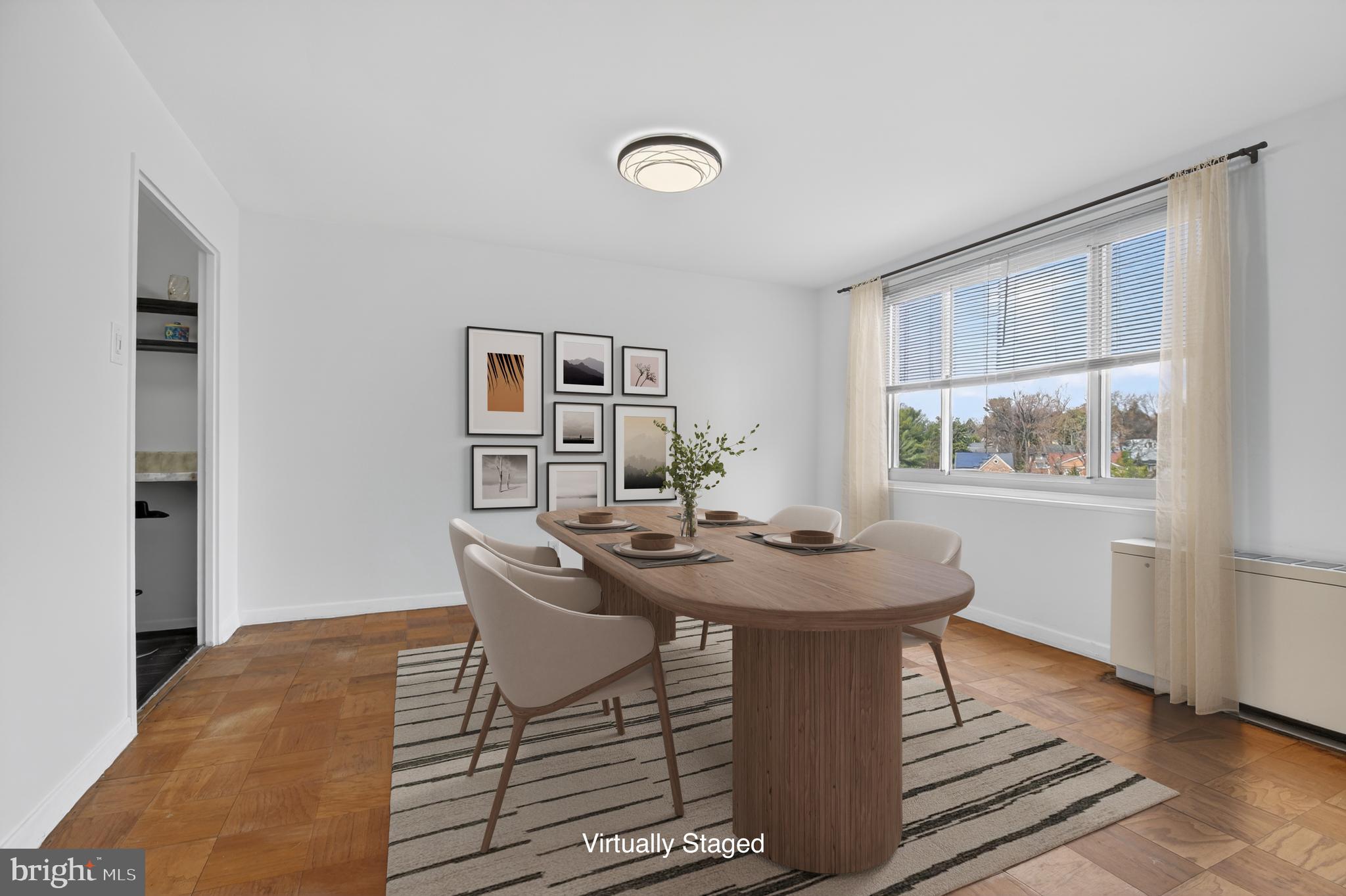 1900 Lyttonsville Road, Unit 718 Silver Spring, MD 20910 - Photo 13 of 35 Dining Room, Virtually Staged