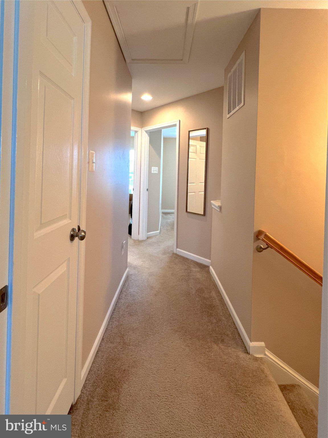 29 Baltic Lane Ranson, WV 25438 - Photo 34 of 39 Inviting hallway with soft lighting.