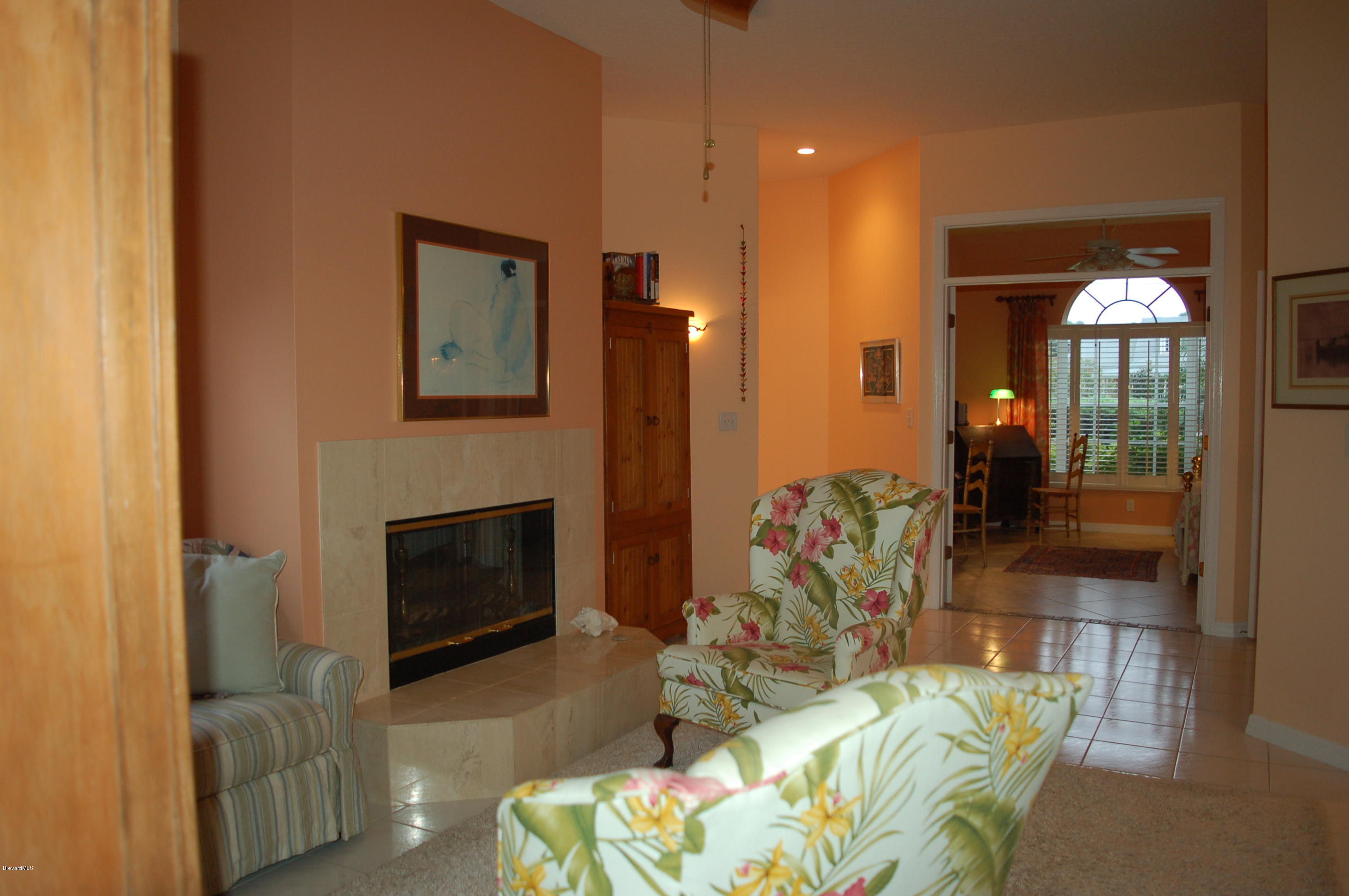 3987 Sparrow Hawk Road Melbourne, FL 32934 - Photo 13 of 21 Family-Hearth Room