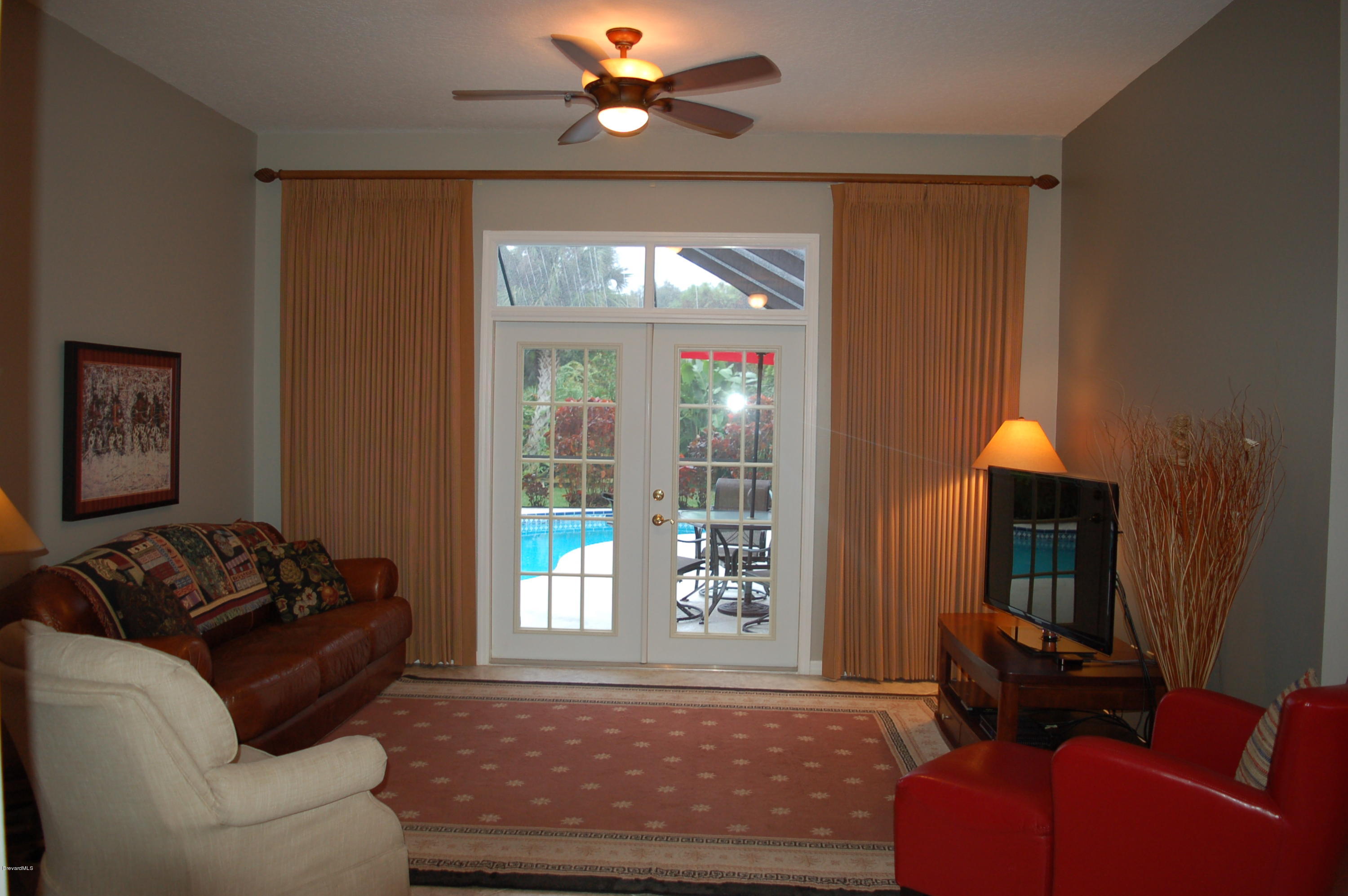 3987 Sparrow Hawk Road Melbourne, FL 32934 - Photo 3 of 21 Living Rm