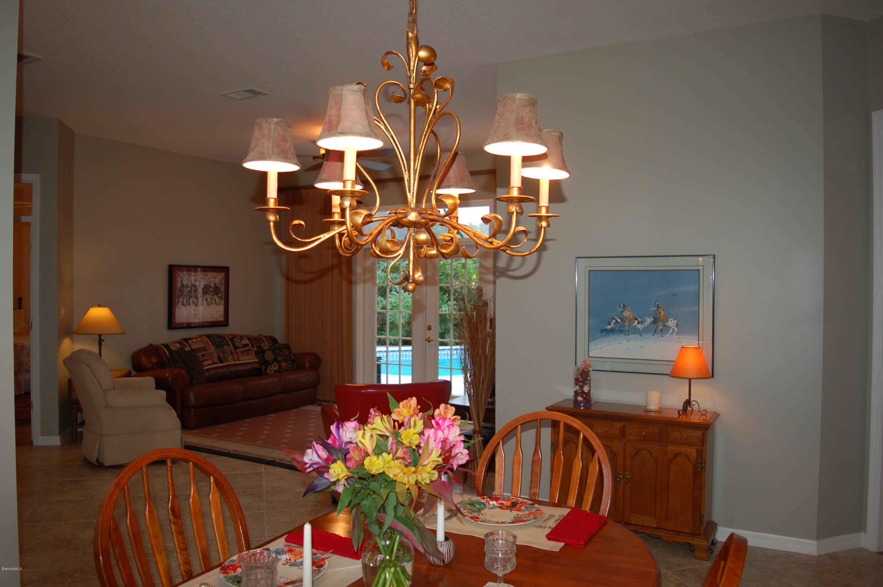3987 Sparrow Hawk Road Melbourne, FL 32934 - Photo 6 of 21 Dining-Living Rms