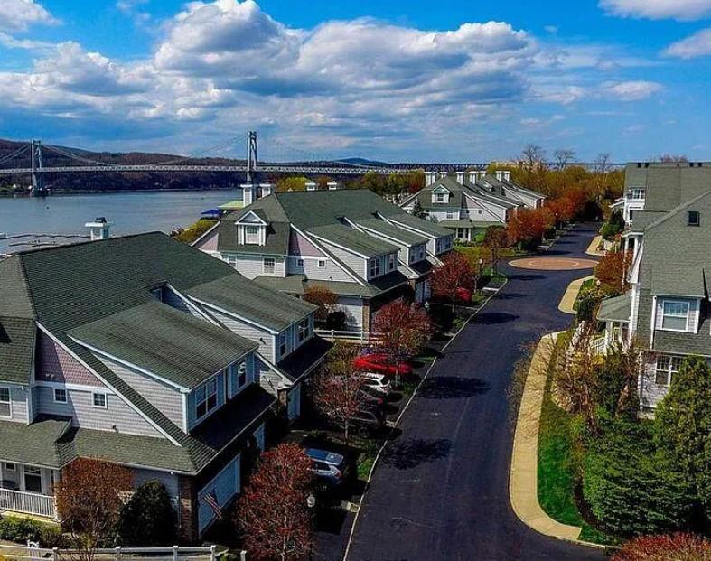 an aerial view of a house with a garden