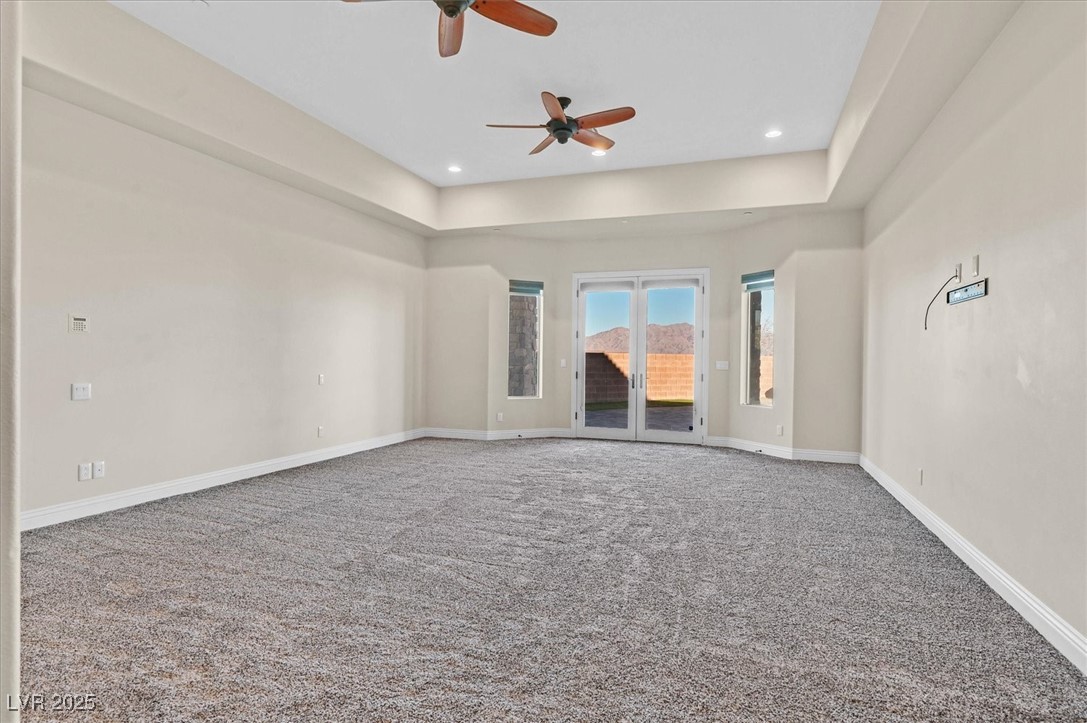 5790 Aspen Falls Circle Las Vegas, NV 89149 - Photo 29 of 61 Carpeted spare room with ceiling fan and baseboards