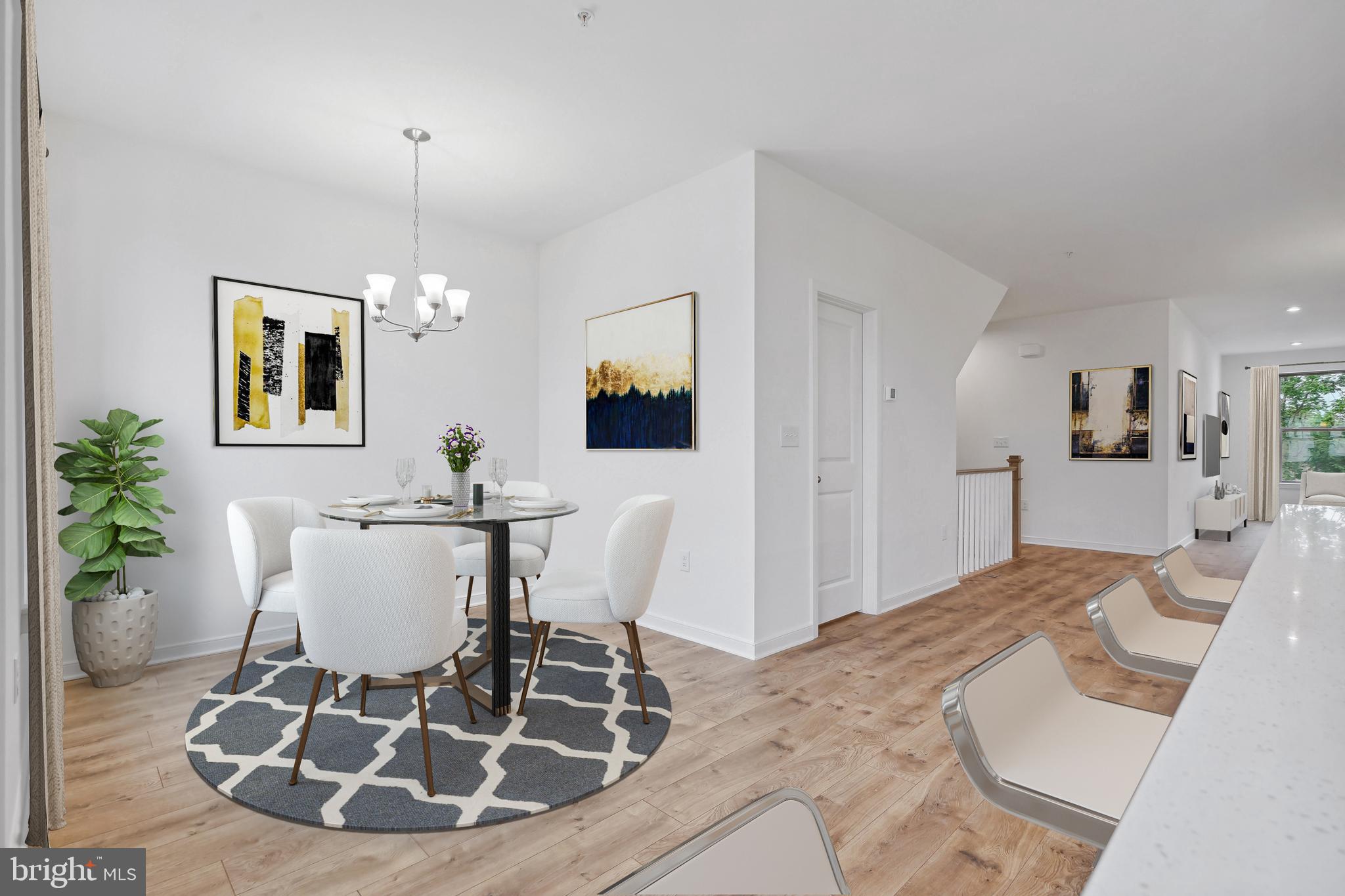 7 Sepia Square, Unit KA Ashburn, VA 20147 - Photo 8 of 19 a view of a dining room with furniture