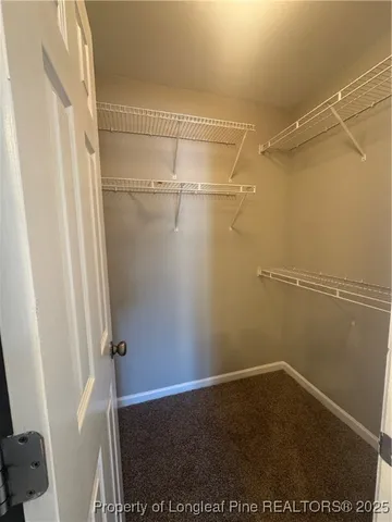 a view of small space with racks on the wall