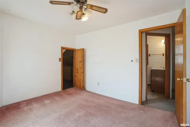 a view of hallway with stairs