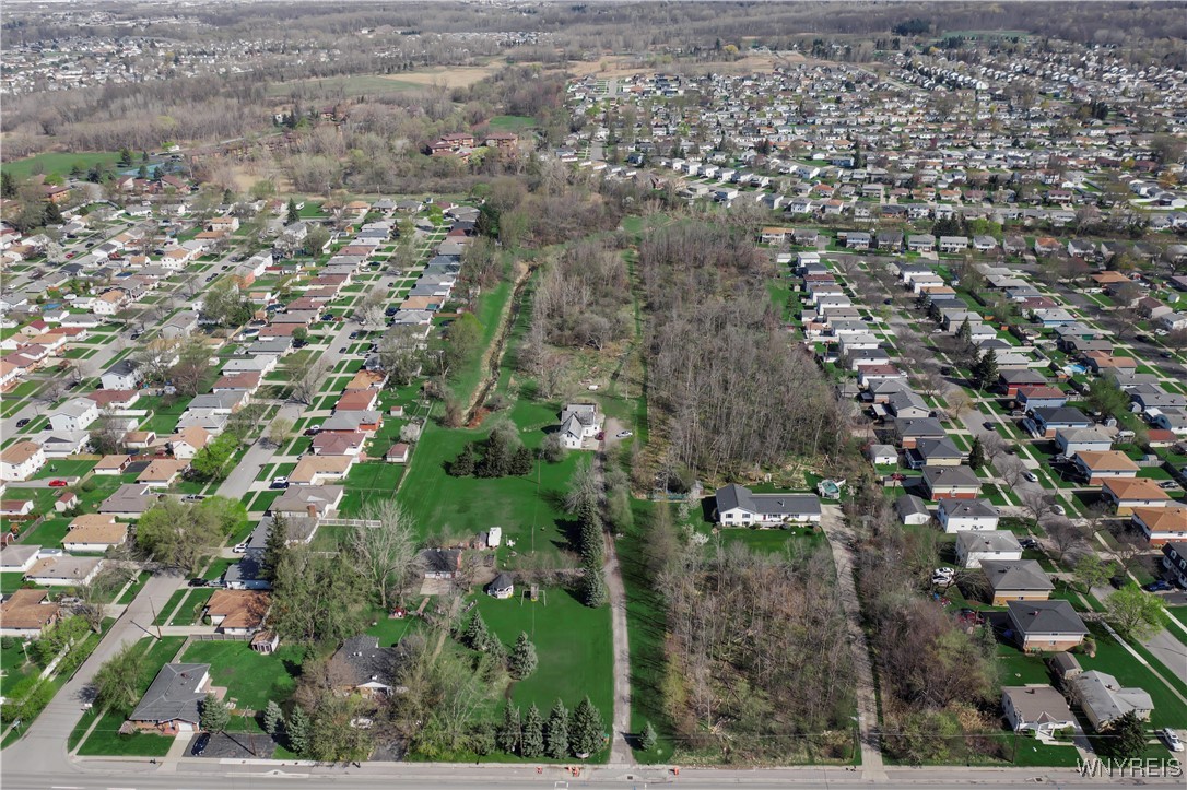 The Lot is directly behind the white split level t