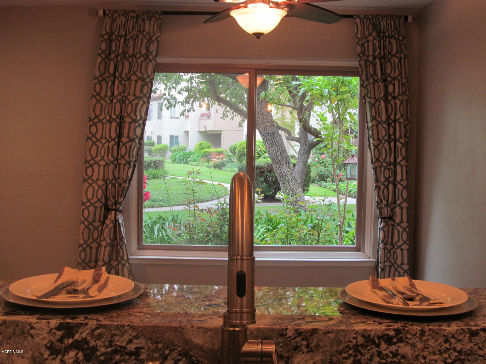 1706 Sinaloa Road, Unit 112 Simi Valley, CA 93065 - Photo 18 of 37 a view of a room with a table and a chairs