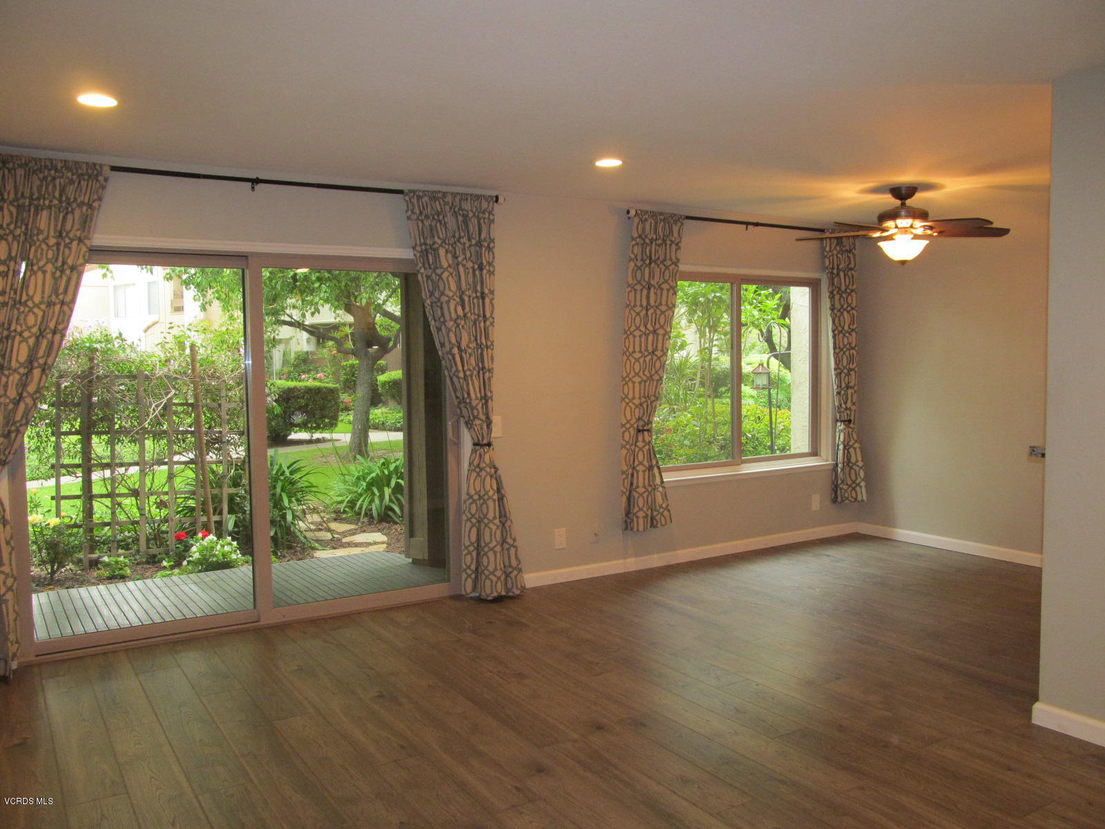 1706 Sinaloa Road, Unit 112 Simi Valley, CA 93065 - Photo 21 of 37 a view of room with wooden floor and fan