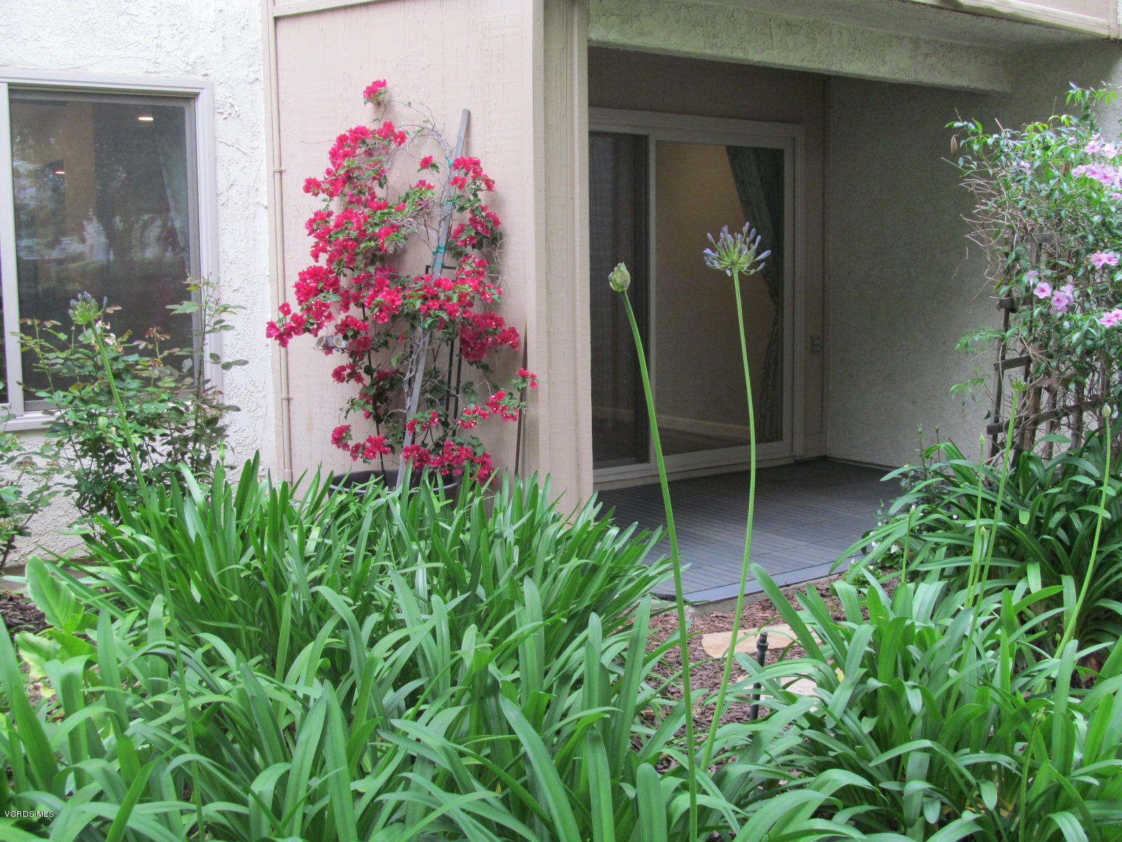 1706 Sinaloa Road, Unit 112 Simi Valley, CA 93065 - Photo 23 of 37 front view of a house with a porch