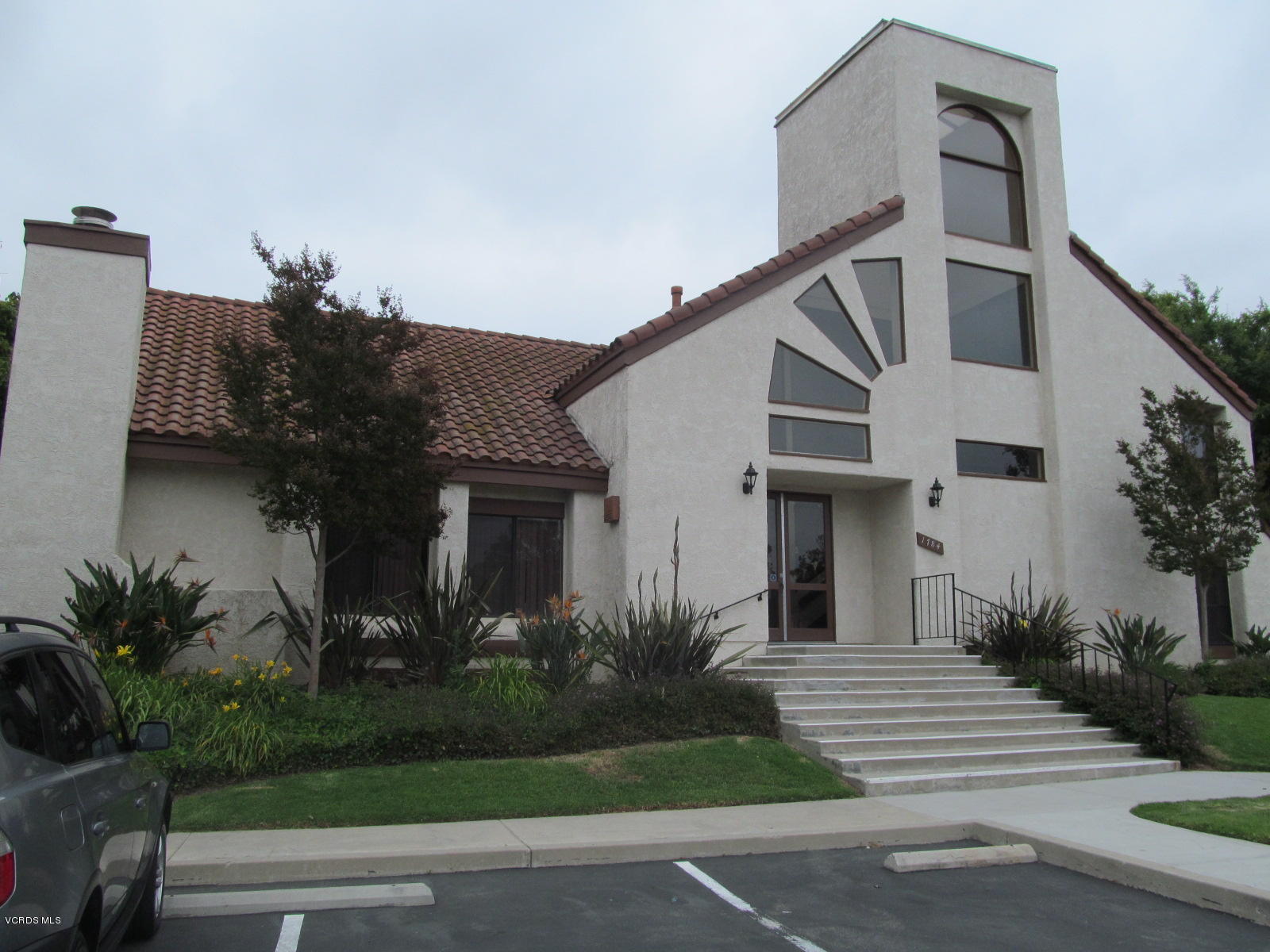 1706 Sinaloa Road, Unit 112 Simi Valley, CA 93065 - Photo 35 of 37 a front view of a house with garden