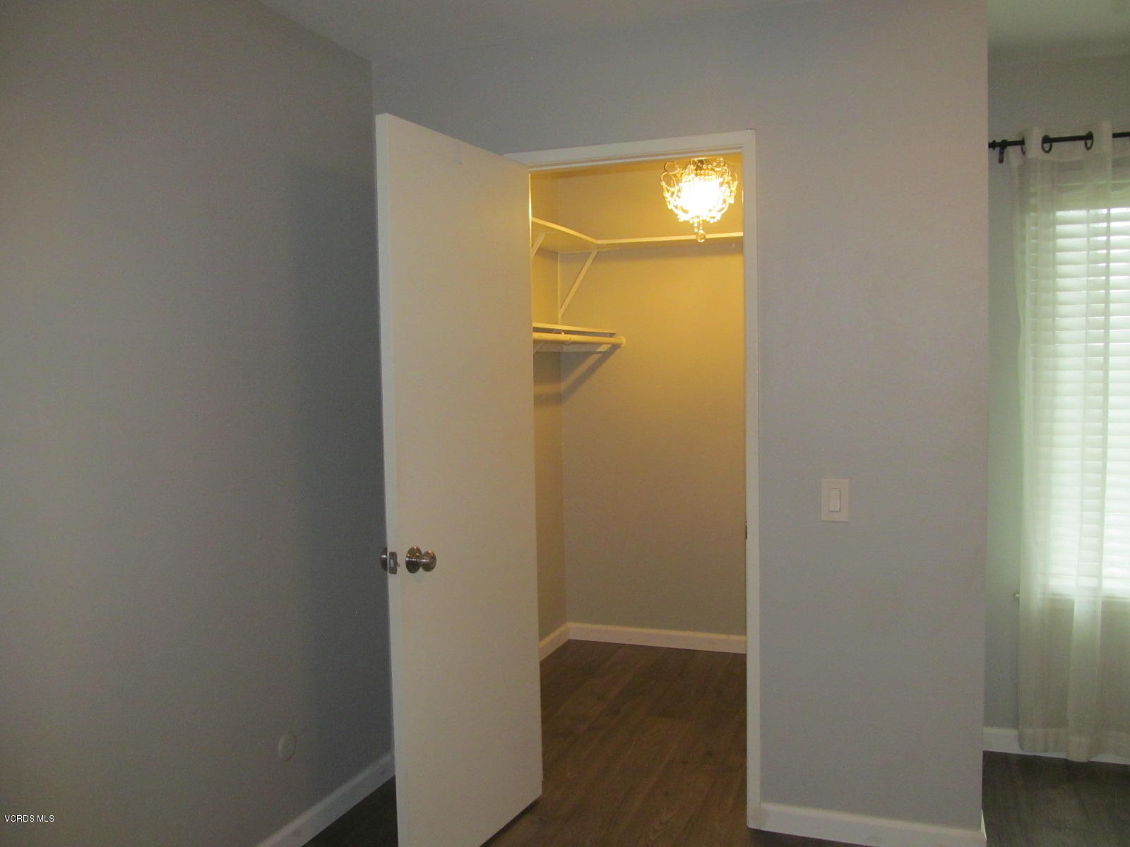 1706 Sinaloa Road, Unit 112 Simi Valley, CA 93065 - Photo 5 of 37 a bathroom with a shower and a mirror