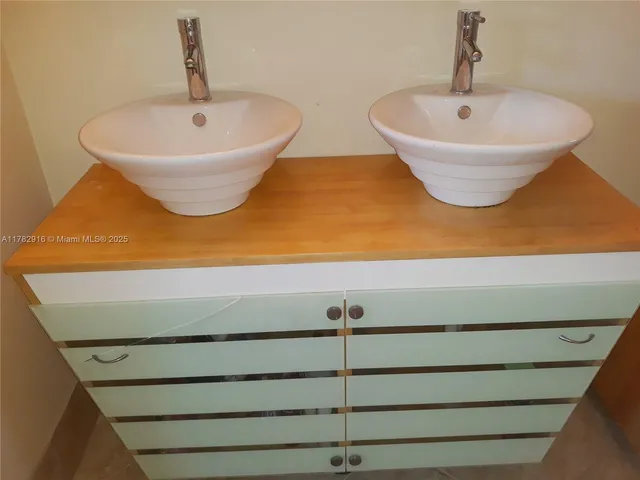 a bathroom with a sink and a bathtub