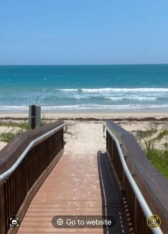 a view of an ocean from a balcony