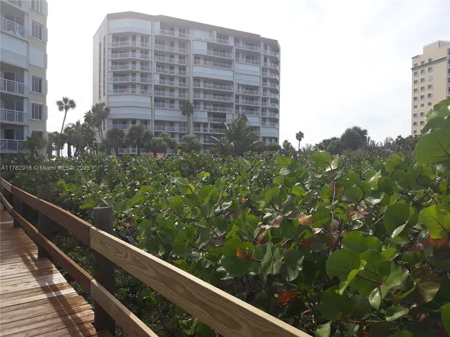 a view of a wooden fence
