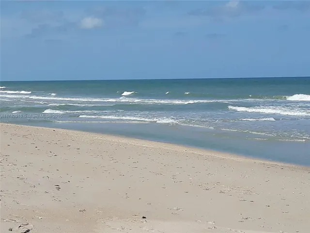 a view of beach and ocean