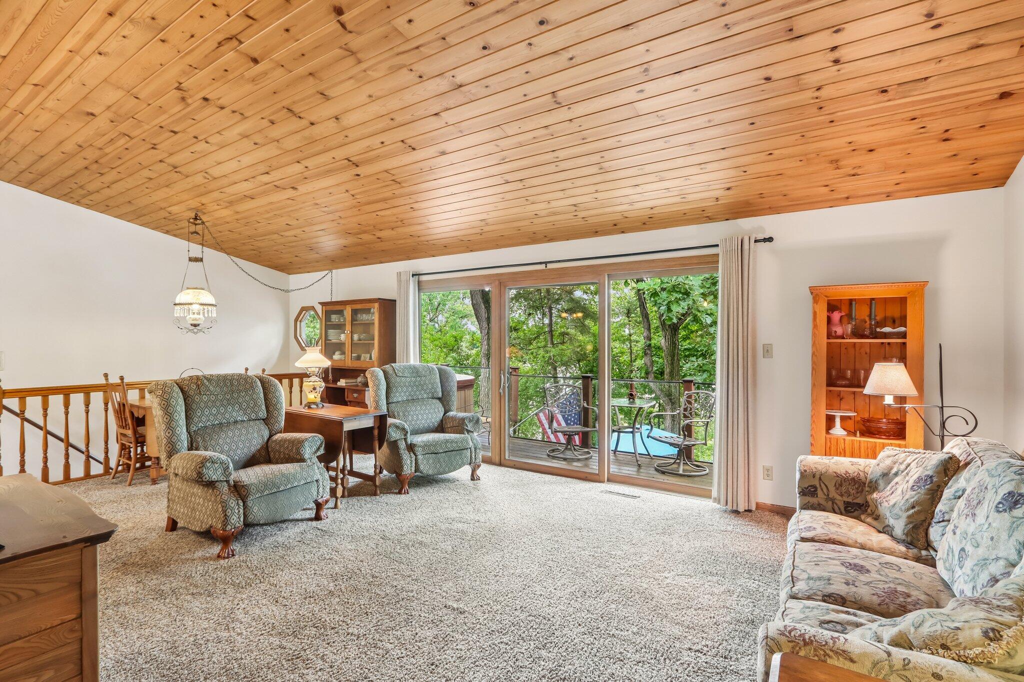 W322N6797 Wildwood Point Road Merton, WI 53029 - Photo 11 of 75 Living with with triple patio doors