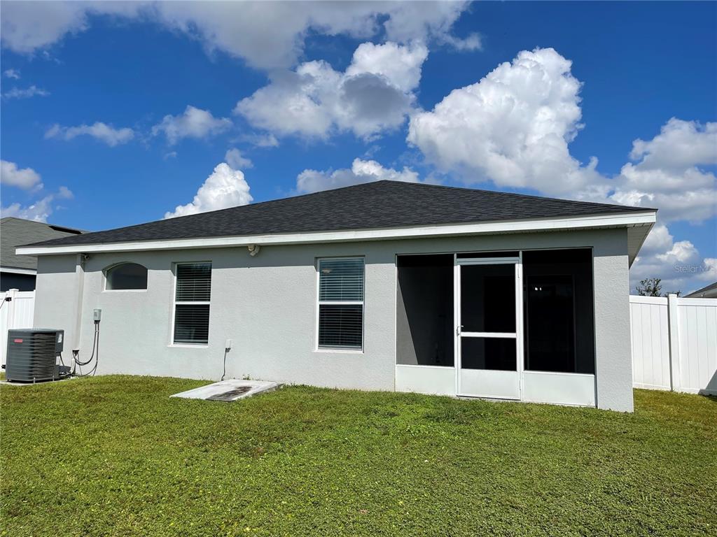 3623 Peregrine Way Lakeland, FL 33811 - Photo 14 of 35 a view of a backyard of the house
