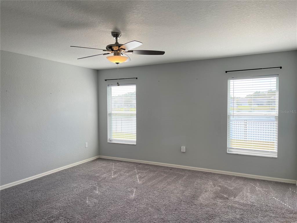 3623 Peregrine Way Lakeland, FL 33811 - Photo 17 of 35 a view of an empty room with a window