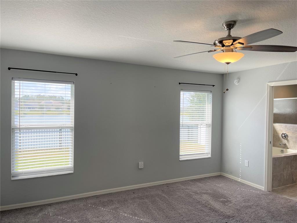 3623 Peregrine Way Lakeland, FL 33811 - Photo 18 of 35 a view of an empty room with a window