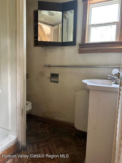 725 Highway 32 Tillson, NY 12486 - Photo 16 of 26 a bathroom with a sink and a mirror