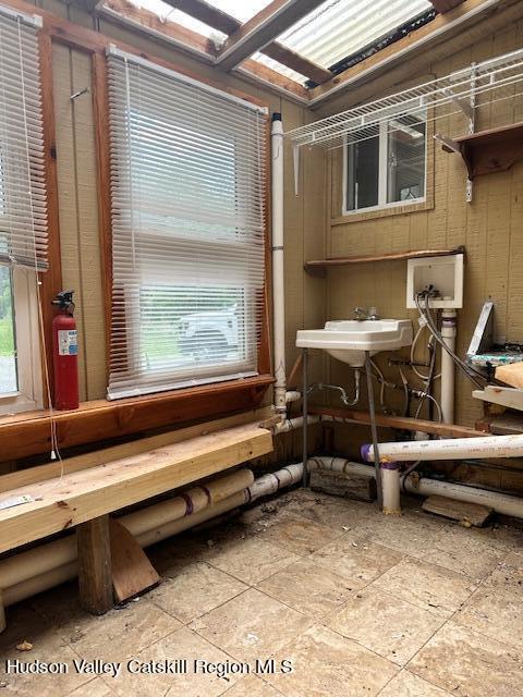 725 Highway 32 Tillson, NY 12486 - Photo 17 of 26 a roof deck with a table and chairs